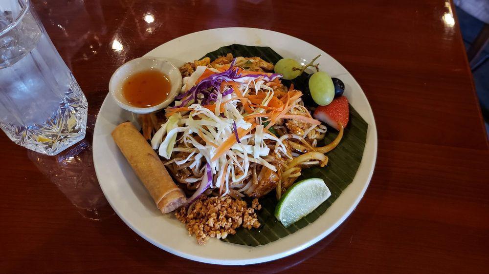 Pad Thai · Traditional thin rice noodle stir fried with chicken, fried tofu, scallion, bean sprout, egg, and grounded peanuts in special homemade sauce.