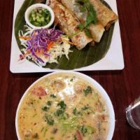Tom Kha Gai · Spicy chicken soup with coconut milk, galanga, kiffir lime leaves, mushrooms, lemon grass, t...
