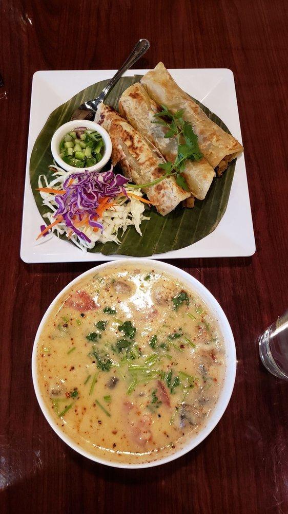 Tom Kha Gai · Spicy chicken soup with coconut milk, galanga, kiffir lime leaves, mushrooms, lemon grass, tomatoes, and chili paste.