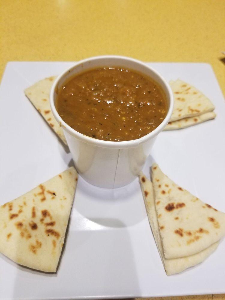 Mediterranean Lentil Soup · Green lentils, vegetables, and ancient grains. Served with warm pita. Vegan.