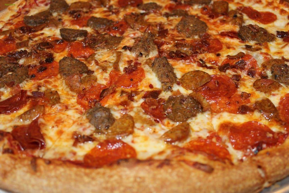 Meat Lovers Pizza · Pizza sauce, pepperoni, link sausage, bacon and meatball. All pizzas include sauce and mozzarella and calzones include sauce, mozzarella and ricotta cheese.