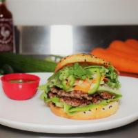 Banh. Com Smash Burger Sandwich · Fresh ground smash burger with pickled carrots or daikon, cucumbers, jalapenos, cilantro, bo...