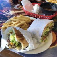 Carne Asada Tortas · Grilled and diced beef steak with lettuce, tomato, onions, jalapenos, guacamole and mayonnai...