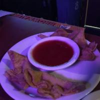 Cheese Wonton · Served with dipping sauce.