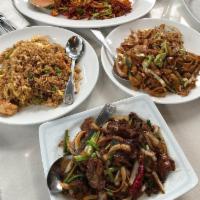 Mongolian Beef · Beef stir-fried in subtly-sweet soy sauce w/ onions, flavored with chili