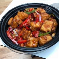 Kung Pao Tofu · Deep-fried tofu stir-fried w/ bell peppers and NUTS.