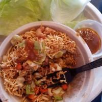 Thai Lettuce Wrap · ground chicken, cashew nut, sweet onion, cabbage, carrots and crispy noodles, served with Th...