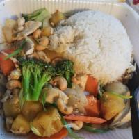 Cashew Chicken · Sauteed chicken with carrot, onion, green onion, broccoli, pineapple and cashew nuts.