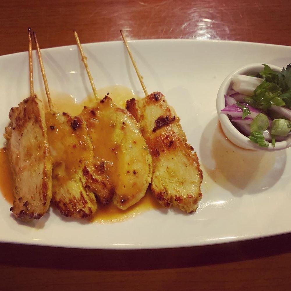 Chicken Satay · Chicken pieces marinated in herbs, spices and coconut milk grilled on skewers. Served with peanut sauce and cucumber salad.
