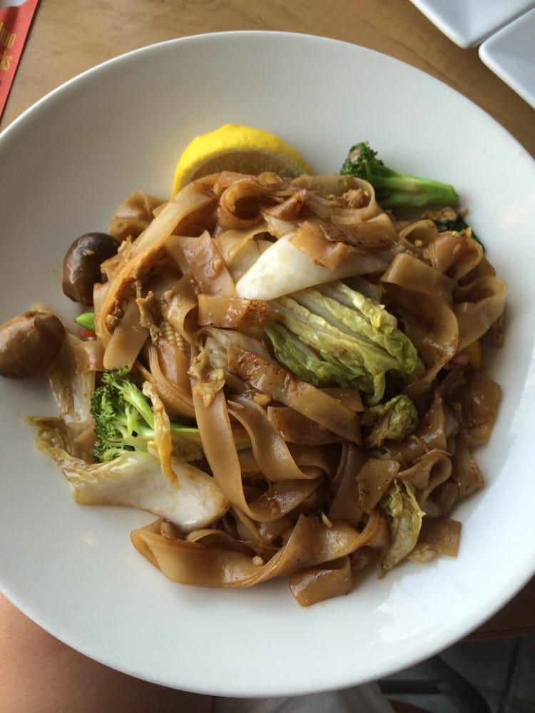 Brown Noodle · Flat rice noodle sauteed with soy sauce, egg, seasonal Asian green broccoli, mushroom and baby corn with your choice of meat.