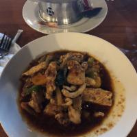 Pad Prig Pow · Your choice of meat sauteed in roasted chili sauce with chili peppers, bamboo shoots and coc...