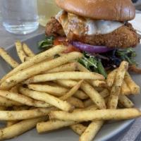 Soco Crispy Fried Chicken Sandwich · Spicy but not too spicy, stacked up mixed greens, melted Jack cheese, red onions, and tomato...