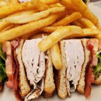 Turkey Club · Freshly roasted turkey, bacon, lettuce, tomato, mayo, white toast, French fries