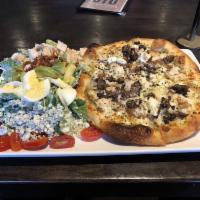 Chicken and Goat Cheese Pizza · Herbed olive oil, chicken, goat cheese, crimini mushrooms, caramelized onions, and spin blen...