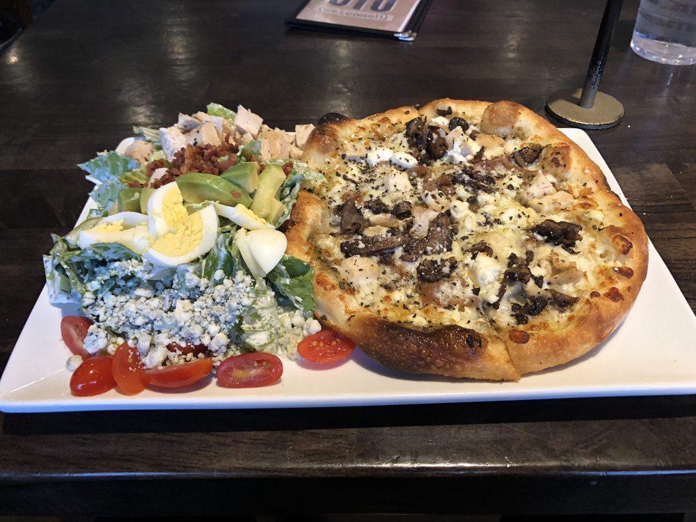 Chicken and Goat Cheese Pizza · Herbed olive oil, chicken, goat cheese, crimini mushrooms, caramelized onions, and spin blend cheese.