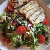 Panko Chicken · Romaine, mixed greens, curry chickpeas, diced tomatoes, feta, almond with a lemon garlic vin...
