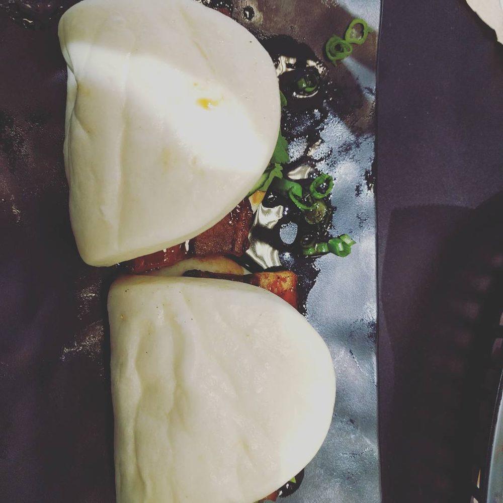 Pork Buns Plate · Tender braised pork belly, cucumber, cilantro and scallions finished with our signature glaze and mustard mayo.