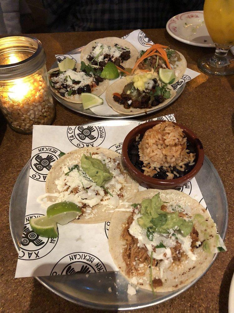 Chipotle Chicken Tinga · braised chicken thigh, queso Cotija, crema.  Served as a single taco OR 2 Tacos with Mexican Rice & Beans