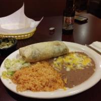 Carne Asada Burrito · Served with pico de gallo and cheese inside, rice and beans on the side. Note: pictured ench...