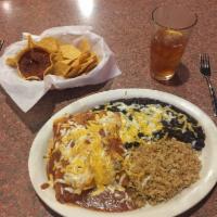 Enchiladas · 3 enchiladas of your choice (chicken, beef or cheese) topped with enchilada sauce and chedda...