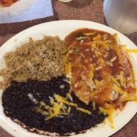 Enchilada · 1 enchilada of your choice (chicken, beef or cheese) topped with enchilada sauce and cheddar...