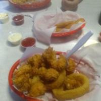 10 Fried Shrimp Basket · Served with a side of your choice: fries, onion rings, sweet potato fries, coleslaw, potato ...