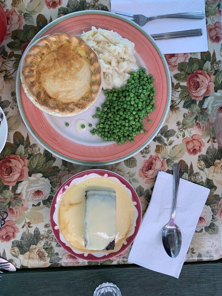 Chicken and Vegetable Pot Pie · Chicken and vegetables in a cream sauce with a delicious pastry crust, served with mashed potatoes and peas. 