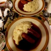 Bangers and Mash · Cumberland sausage and regular sausage with mashed potatoes and onion gravy.
