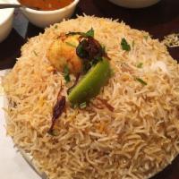 Goat Biryani · An Indian dish made to be thoroughly enjoyed by anyone who eats it. Made with the best basma...