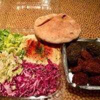 Falafel Trio Platter · All 3 falafel flavors, hummus, Israeli salad, white and red cabbage, romaine lettuce, olives...