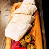 Chicken Shawarma Wrap · 100% fresh chicken, spiced and cooked on open flame, with french fries, pickled cucumbers an...