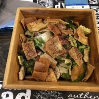 Fattoush · Delicious mix of lettuce, green peppers, chopped Italian parsley, cucumbers, and tomatoes. L...