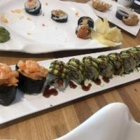 Dragon Roll · Tempura shrimp, crab sticks, smoked eel and avocado.