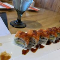 Mexican Roll · Fried crab meat, eel, avocado topped with spicy tuna.