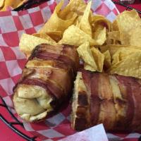 Adrian's Burrito · Bacon wrapped flour tortilla with choice of steak or chicken, avocado, chipotle, rice, beans...