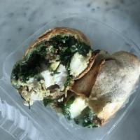Liv Wrap · Grilled chicken breast, avocado, quinoa, kale, Jack cheese and homemade pesto on a whole whe...