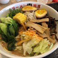 Miso Ramen · Miso paste soup, topped with bamboo shoots, roast pork (charshu), bean sprouts, chopped scal...