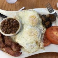 English Breakfast · 2 eggs your style, sausage or bacon, grilled tomato, mushrooms, baked beans, and English muf...