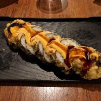 Super Bad Boy Roll · Eel, avocado, snow crab, cream cheese all tempura'd topped with seared spicy crab mix, spicy...