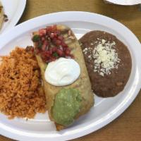 Chimichanga · Deep fried burrito. Choice of meat, rice, beans, cheese, guacamole, sour cream, lettuce and ...