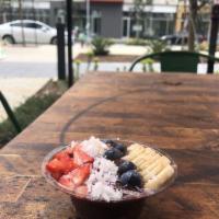 Acai Bowl · Acai, strawberries, banana,blueberries, nut granola topped, coconut flakes, with honey