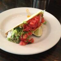 Gringo Taco · Ancho-cumin ground beef, cheddar and Jack cheese, lettuce, pico de gallo, and sour cream.  S...