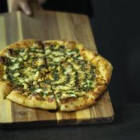 Pesto Chicken Pizza · Herbed olive oil, fresh mozzarella, chicken, pesto, and spin blend cheese.