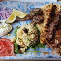 Wicked Meat Platter · Lamb chops, pork gyro, chicken and beef souvlaki or ground beef/lamb kebab. Comes with 2 pit...