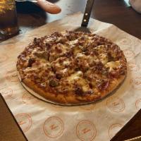 A Lot a Meat Pizza · Canadian bacon, Italian sausage, pepperoni and bacon.