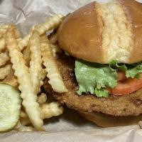 Pork Tenderloin · Breaded pork cutlet, deep fried till golden brown, finished with lettuce, tomato and mayonna...