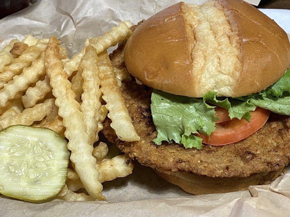 Pork Tenderloin · Breaded pork cutlet, deep fried till golden brown, finished with lettuce, tomato and mayonnaise. Served on a rotella's bun. Comes with house made potato.
