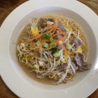Pad Thai · The most famous Thai rice noodle dish stir-fried with egg, bean sprouts and Thai special sau...