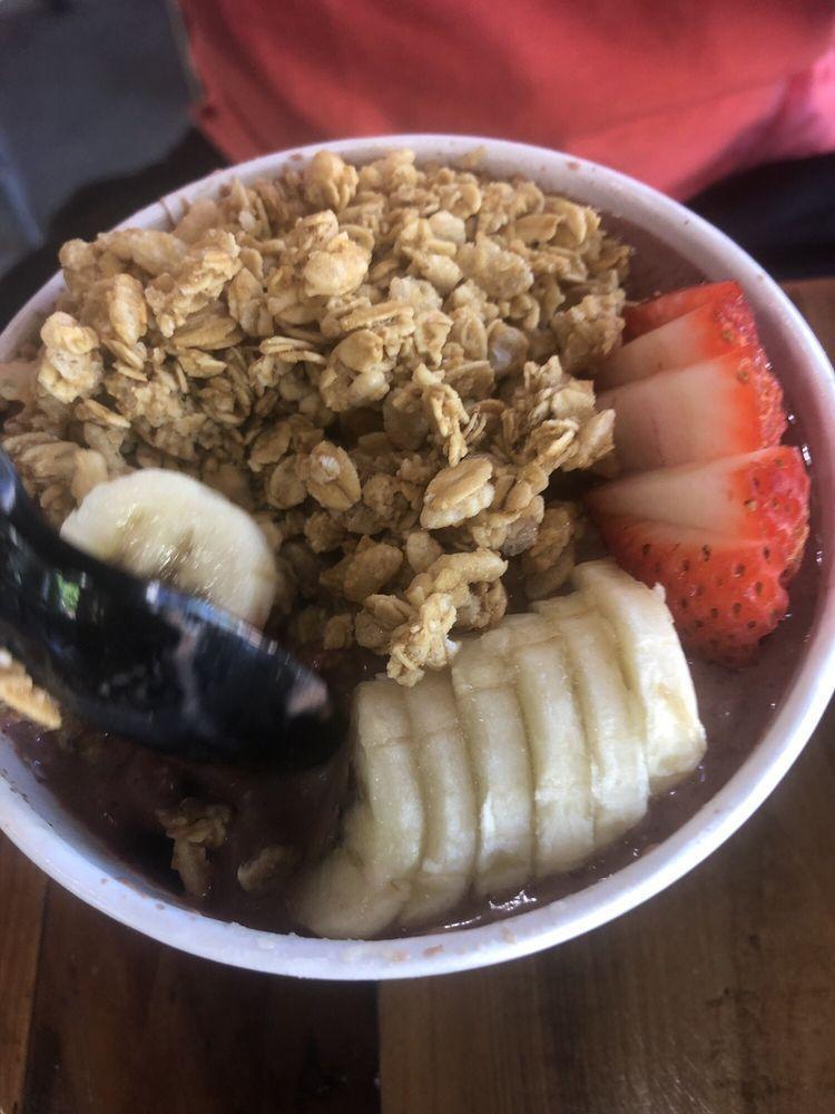 The Nutty Bowl · Acai Blended with Banana, Strawberries, Almond Butter, Cacao, Camu Camu, Maple Syrup & Almond Milk. Topped with Granola, Banana & Strawberries (Seasonally)