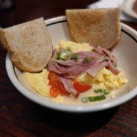 Carved Ham & Swiss Sandwich · Pecan wood smoked ham, Swiss cheese, tomato, red onion, stoneground mustard, baguette.